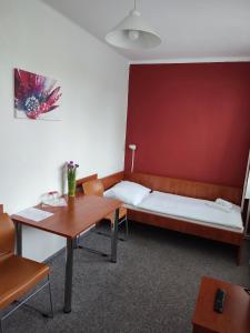 Posteľ alebo postele v izbe v ubytovaní BEST Hotel Garni