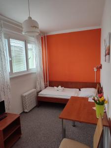 Posteľ alebo postele v izbe v ubytovaní BEST Hotel Garni