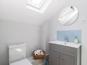 a bathroom with a sink and a mirror at Little Lugg in Hereford +33 photos