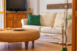A television and/or entertainment centre at Maison Jolie