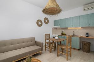 Kuchyň nebo kuchyňský kout v ubytování Kallia's Suites Milos