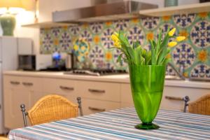 A kitchen or kitchenette at Maison Jolie