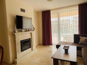 TV a/nebo společenská místnost v ubytování Kaliakria Resort "Bluesky"