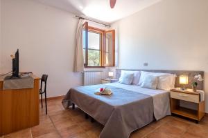 Letto o letti in una camera di Villa Grazia