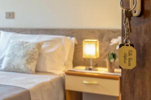 Letto o letti in una camera di Villa Grazia