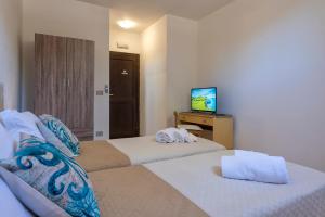 Letto o letti in una camera di Villa Grazia