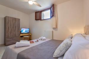 Letto o letti in una camera di Villa Grazia