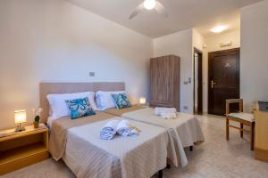 Letto o letti in una camera di Villa Grazia