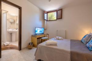 Letto o letti in una camera di Villa Grazia