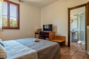 Letto o letti in una camera di Villa Grazia