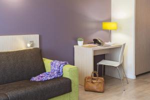 Posezení v ubytování Aparthotel Adagio Access Paris Clichy