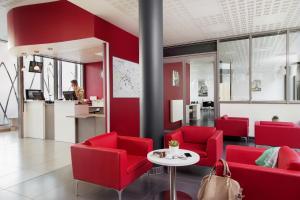 Kuchyň nebo kuchyňský kout v ubytování Aparthotel Adagio Access Paris Clichy