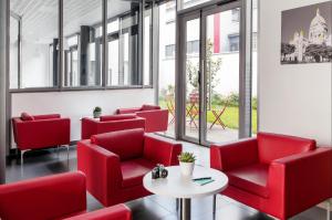 Posezení v ubytování Aparthotel Adagio Access Paris Clichy