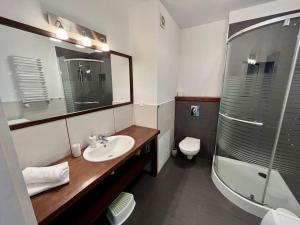 Kúpeľňa v ubytovaní Apartament Hemingwaya