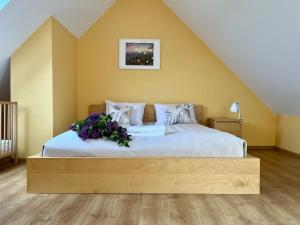 Posteľ alebo postele v izbe v ubytovaní Apartament Hemingwaya
