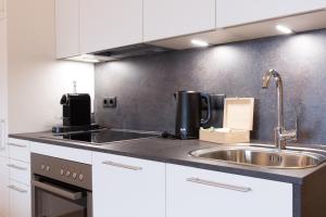 Kuchyňa alebo kuchynka v ubytovaní Apartment Wiesenhof - NATUR & WEITBLICK über Innsbruck - Ladestation für Elektroautos