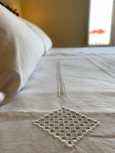 Postel nebo postele na pokoji v ubytování Il Duomo Relais