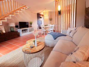 O zonă de relaxare la Feriendorf Rugana - Komfortplus Appartement mit 2 Schlafzimmern und Terrasse A28