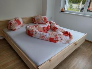 Postel nebo postele na pokoji v ubytování Apartment im Haus mit Herz