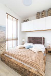 Tempat tidur dalam kamar di Season Surprise Apartment, By Cohost