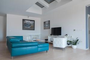 Zona de estar de Penthouse Apartment