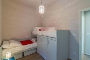 Postel nebo postele na pokoji v ubytování CASA BRIGITTE Comfort, Vista e Parcheggio