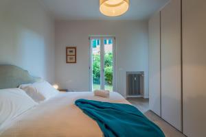 Postel nebo postele na pokoji v ubytování CASA BRIGITTE Comfort, Vista e Parcheggio
