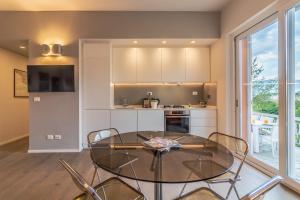 Kuchyň nebo kuchyňský kout v ubytování CASA BRIGITTE Comfort, Vista e Parcheggio