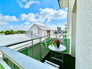 Un balcon sau o terasă la Saint Nazaire - White Lion - Centre ville - Au calme - Parking privatif aérien - Internet haut débit Fibre