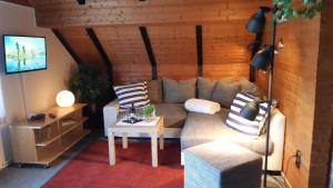 Posezení v ubytování Nordsee Haus An't Oll Deep