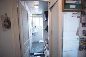 a bathroom with a sink and a toilet in a room at Cozy 1 Bedroom Apartment In 14th in Paris