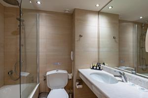 Kúpeľňa v ubytovaní Minos Hotel