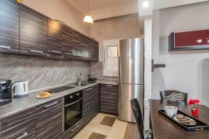Kuchyňa alebo kuchynka v ubytovaní Olive tree Apartment + 29 fotografií