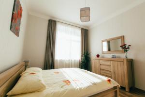 Cama o camas de una habitación en Riga Street Apartments in Valmiera - 20
