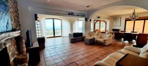Ein Sitzbereich in der Unterkunft Villa Puerto Blanco