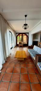 Ein Sitzbereich in der Unterkunft Villa Puerto Blanco