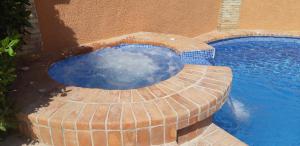 Der Swimmingpool an oder in der Nähe von Villa Puerto Blanco