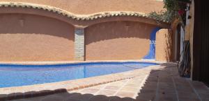 Der Swimmingpool an oder in der Nähe von Villa Puerto Blanco