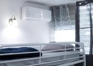 Postel nebo postele na pokoji v ubytování Marina House