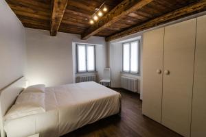 Postel nebo postele na pokoji v ubytování Residence Il Muretto
