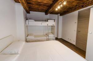 Postel nebo postele na pokoji v ubytování Residence Il Muretto