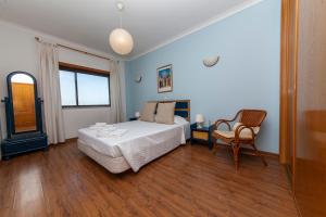 En eller flere senge i et værelse på Gama Marina View Apartment