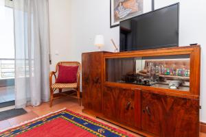 Et tv og/eller underholdning på Gama Marina View Apartment