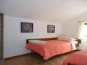 Postel nebo postele na pokoji v ubytování Dragana + 10 fotografií