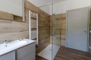 Koupelna v ubytování Residence Il Muretto + 25 fotografií