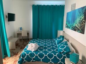 Voodi või voodid majutusasutuse Residence R&B Tyrrhenum toas