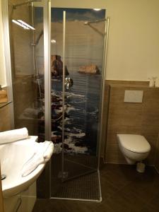 Koupelna v ubytování Apartments Clara