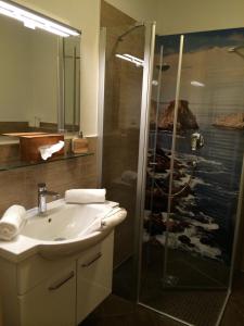 Koupelna v ubytování Apartments Clara