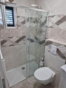 Koupelna v ubytování Apartmani Biser