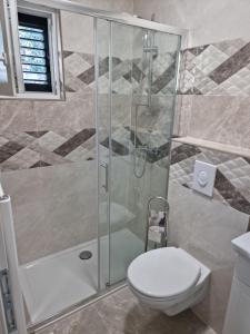 Koupelna v ubytování Apartmani Biser